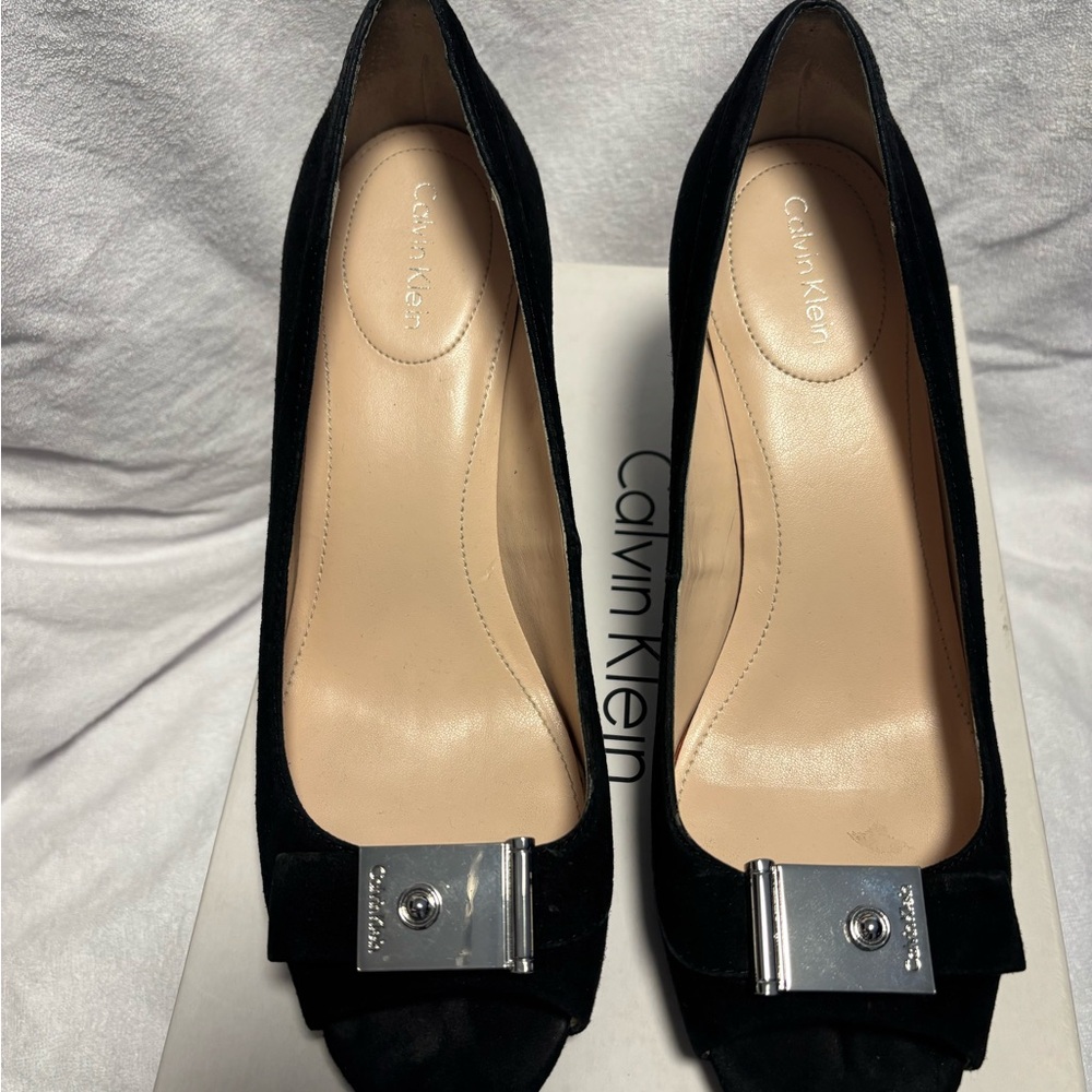 Calvin Klein Black Suede Women’s Heels with Silver Buckle Accent. Open toe